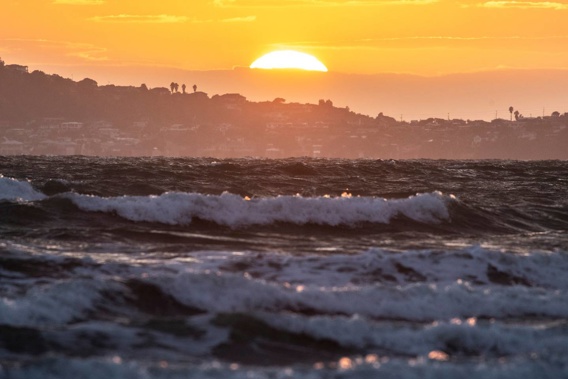 Choppy surf on Orewa Beach, Auckland, on January 13, 2021. (Photo / Michael Craig)