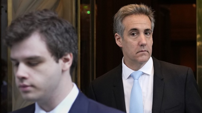 Michael Cohen, right, leaves his apartment building in New York, Tuesday, May 14, 2024. Photo / Seth Wenig | AP