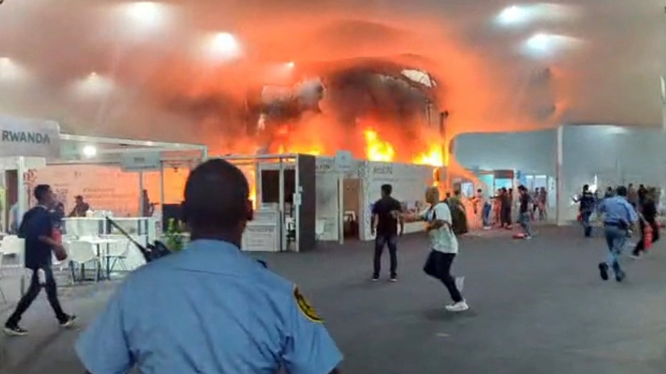 Watch: Fire erupts at UN climate talks forcing panicked delegates to run for the exits