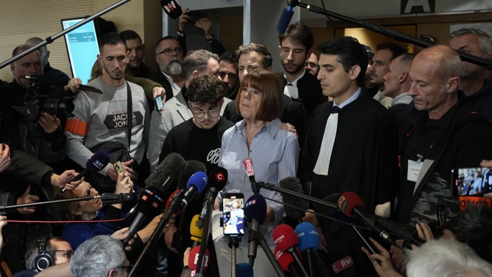 Gisele Pelicot gives a statement inside the courthouse next to her lawyer Stephane Babonneau (R) after a verdict in the Pelicot case on December 19, 2024 in Avignon, France. (Photo by Julien Goldstein/Getty Images)