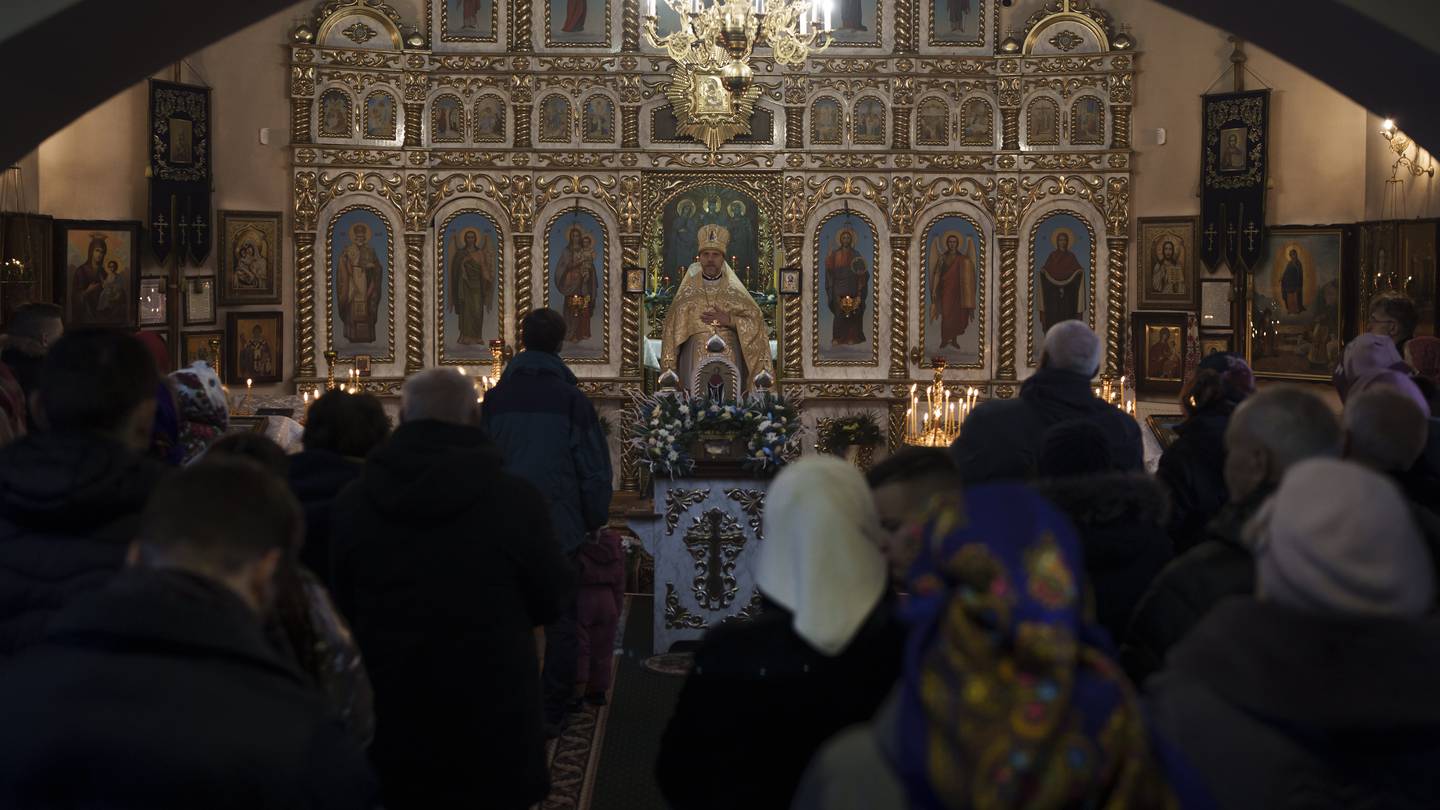 Ukrainians attend a Christmas mass at an Orthodox Church in Bobrytsia on the outskirts of Kyiv, Ukraine. Photo / AP