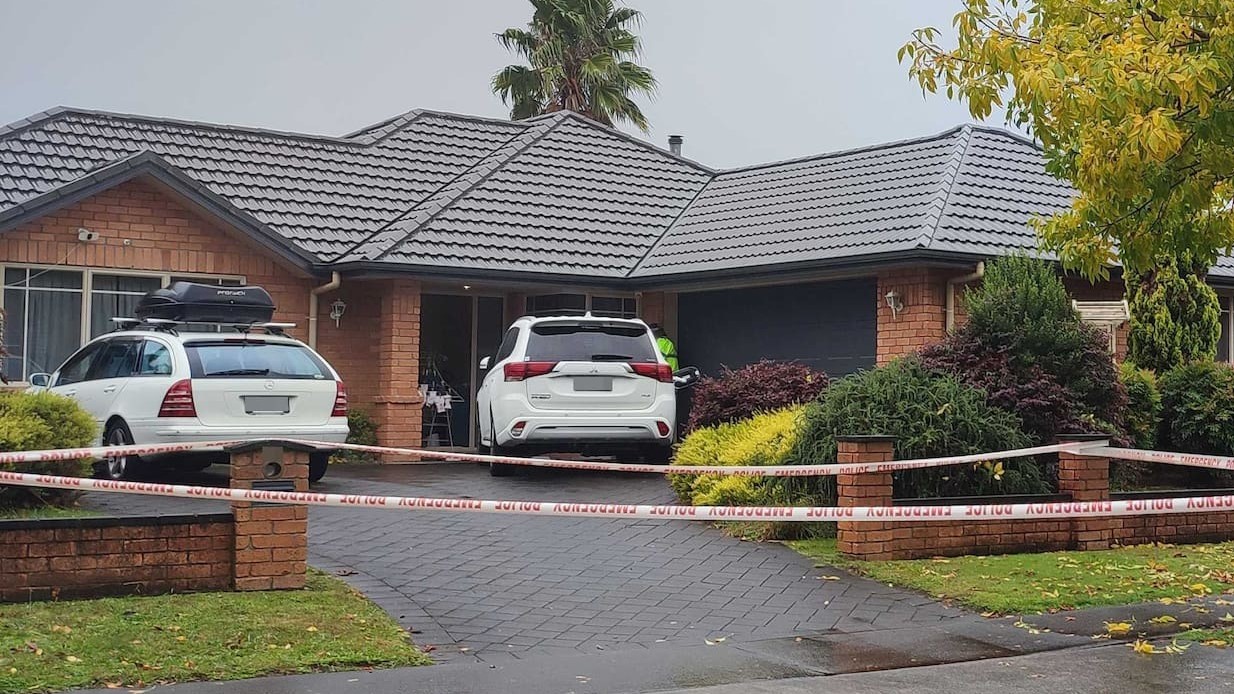 Police at the scene of a homicide investigation on Cranmer Close, Rototuna. Photo / Maryana Garcia