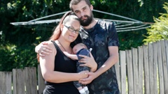 Danielle and Devlin Maras with their 5-week-old baby were victims of an elaborate rental property scam. Photo / Michael Cunningham