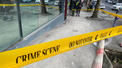 Police outside the complex where Herbert Bradley died on August 23.