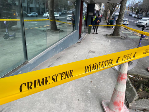Police outside the complex where Herbert Bradley died on August 23.