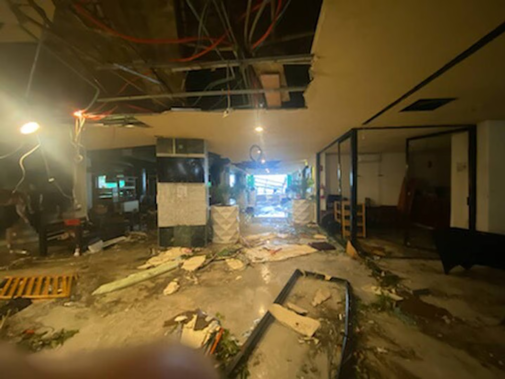 Damage inside Kennedy's hotel post-hurricane. Photo / Don Kennedy