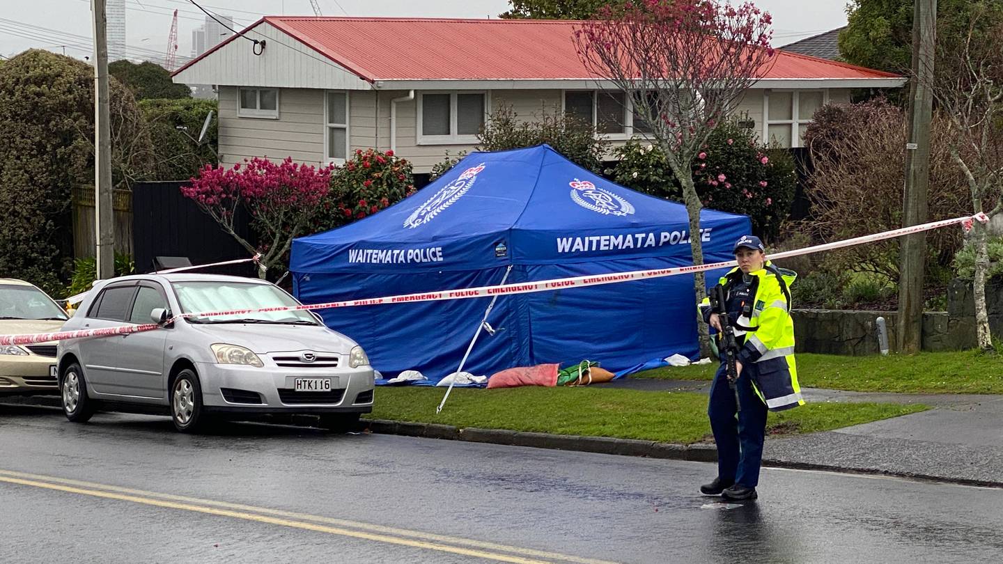 Police on Ocean View Rd, Northcote, where Kevin Hay was killed. Photo / Ben Leahy