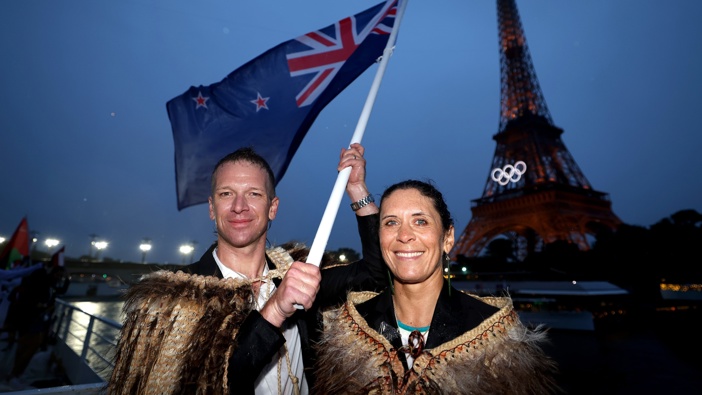 New Zealand flag bearers Aaron Gate and Jo Aleh at the opening ceremony. Photo / Getty Images