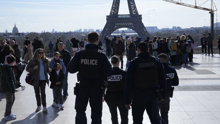 Police officers patrol on the Trocadero square Monday, March 25, 2024 in Paris. Photo / AP
