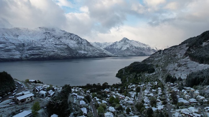 Snow fell down to lake level in Queenstown for the first time this year. Photo / Supplied
