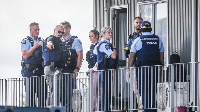 Police descended on a motel in Hastings on Tuesday. Photo / Paul Taylor