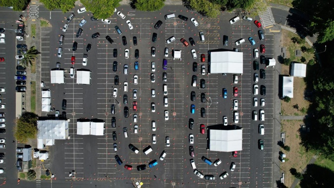 Cars queue at the Ōtara Covid Testing Station in Auckland. (Photo / Brett Phibbs)