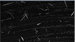 Footage from Brendon Reid's camera in Northland. The lighter dots in the background are stars moving across the field of view of the camera and the brighter streaks are meteorites burning up.