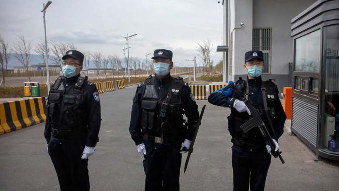 Police officers outside Urumqi No. 3 Detention Centre in Dabancheng, in western China's Xinjiang Uyghur Autonomous Region, on April 23, 2021. (Photo / AP)