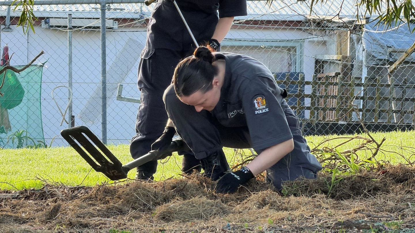 Police specialist search teams sift through Maybury Reserve in Glen Innes, Auckland, where a machete was found on Monday, in connection with the alleged homicide of Kyle Whorrall. Photo / New Zealand Police
