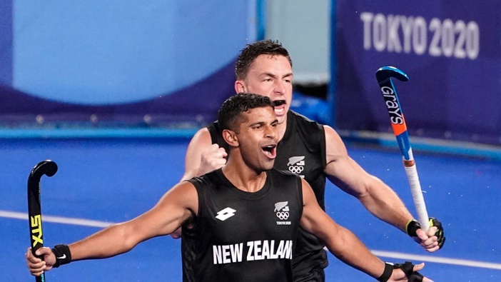 New Zealand's Jared Panchia reacts after Nick Wilson scores the go-ahead goal on Spain goalkeeper Francisco Cortes Juncosa during a men's field hockey match at the 2020 Tokyo Olympics. Photo / AP