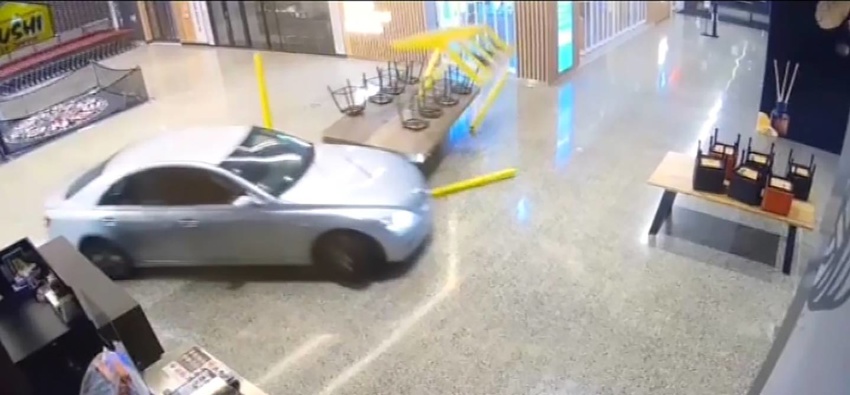 CCTV image of a brazen ram raid involving three cars and 16 people at the Ormiston Town Centre in south Auckland in the early hours of April 26. (Image / Newshub)