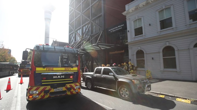 Fire and Emergency crews respond to a fire at the Auckland City Mission. Photo / Jason Oxenham