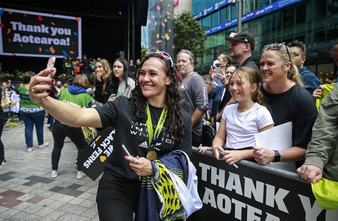 Portia Woodman takes selfies with the fans at the Black Ferns celebration. Photo / Alex Burton