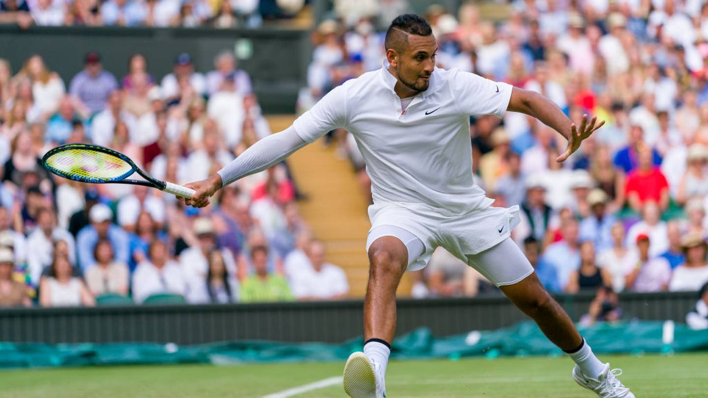 Nick Kyrgios wearing a long sleeve to hide self harm scars during the 2019 Wimbledon tournament. Photo / Getty
