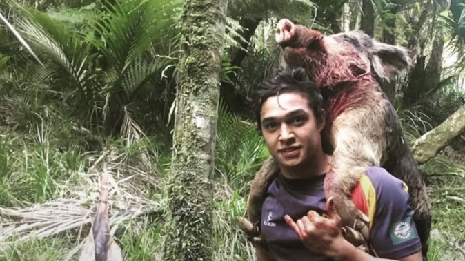 Te Maire Martin in the bush pig hunting. Photo / Supplied.
