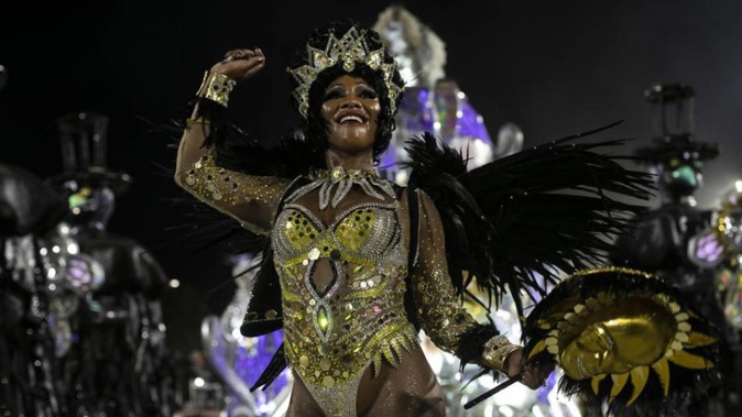 A performer from the Viradouro samba school parades during Carnival celebrations. Photo / AP