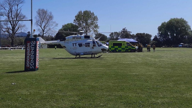 The rescue helicopter was at the scene along with two ambulance crews after a player collapsed. Photo / Supplied