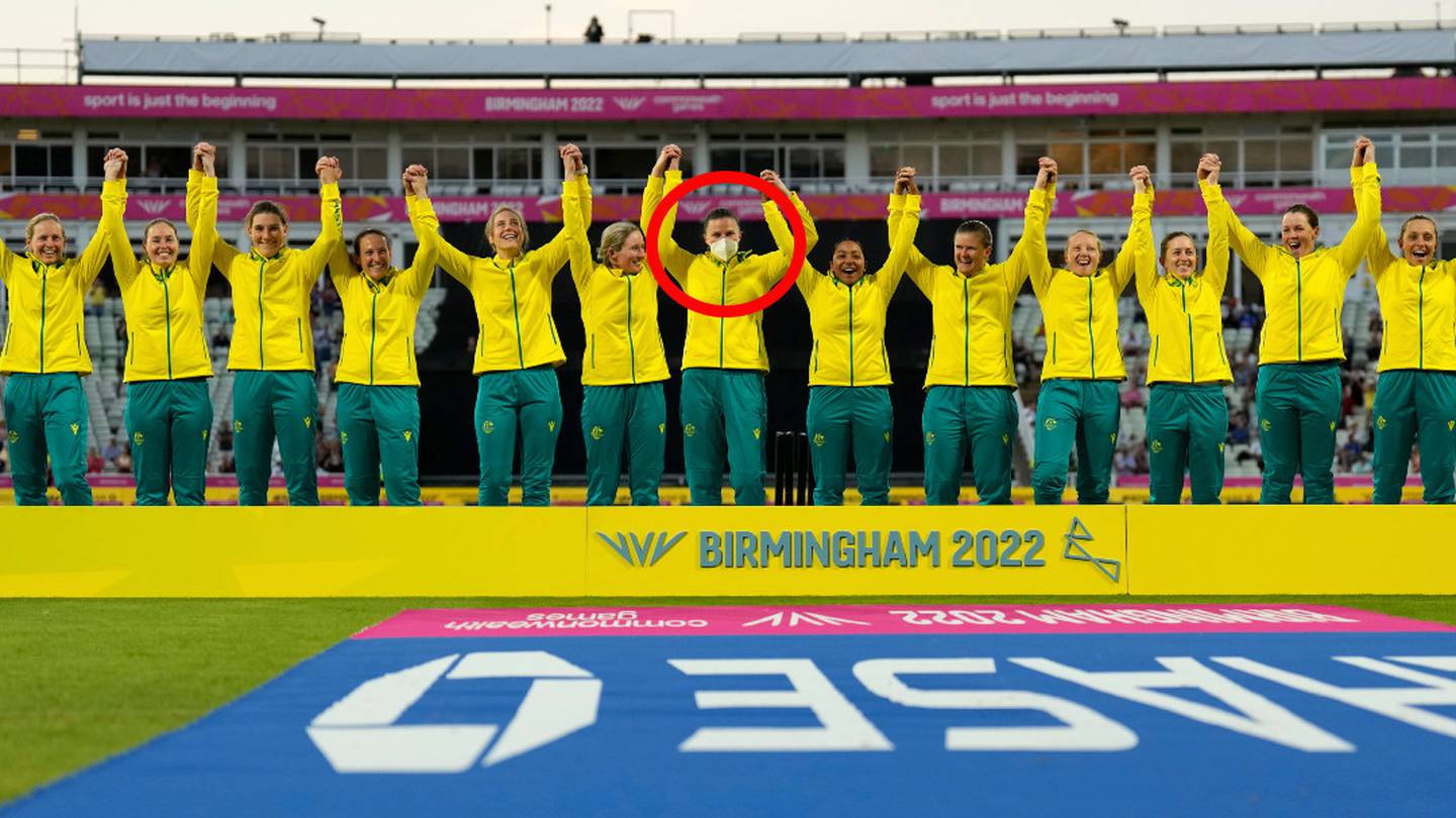 Tahlia McGrath initially wore a mask while her team celebrated victory.. but it didn't stay on for long. Photo / AP