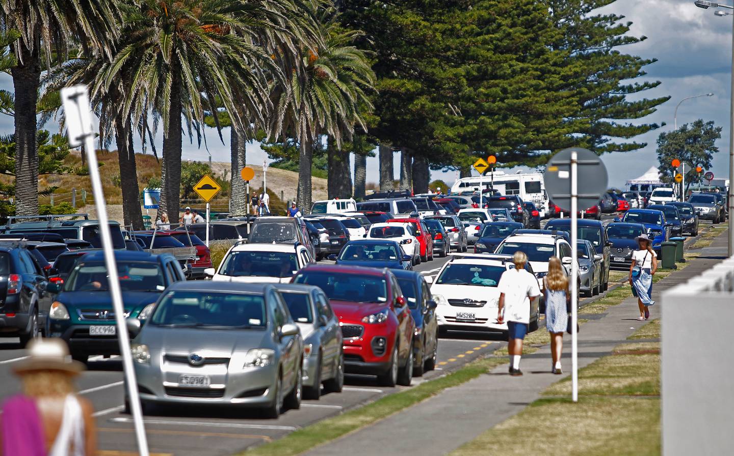 Slow traffic and a lack of parking spaces is a typical scene at Mount Maunganui during summer. Photo / George Novak