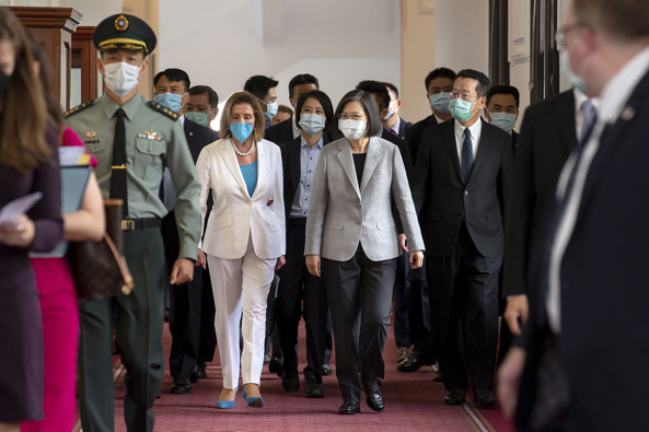 House Speaker Nancy Pelosi, center left, and Taiwanese President President Tsai Ing-wen arrive for a meeting in Taipei, Taiwan
