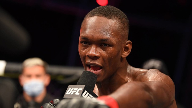 Israel Adesanya became the latest UFC athlete to be rewarded for returning 50 clean PED tests. Photo / Getty Images