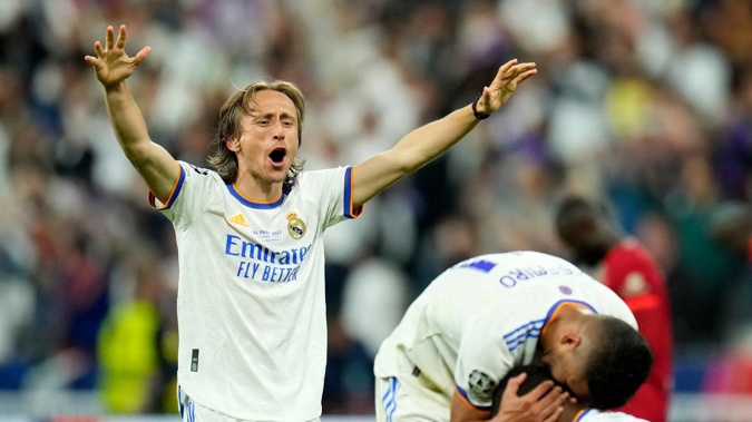 Real Madrid's Luka Modric celebrates after winning the Champions League final soccer match between Liverpool and Real Madrid at the Stade de France in Saint Denis near Paris. Photo / AP