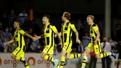 Wellington Phoenix players celebrate their win during the FFA Cup Quarter Final match against Melbourne City. (Photo / Getty)