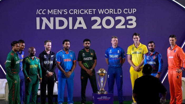 Captains pose for photographs with the ICC Men's Cricket World Cup trophy in Ahmedabad, India. Photo / AP