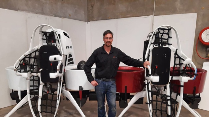 Skylarc Asset Realisation's Sam Brown with one of the two Martin Jetpacks up for sale. Photo / Supplied