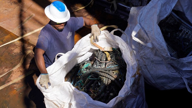 A bag of plastics and debris collected in the Great Pacific Garbage Patch is unloaded in Sausalito, California in July 2022. Eric Risberg/AP