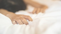 A woman was raped by her ex-partner as their 5-year-old child lay asleep in the bed next to them.
