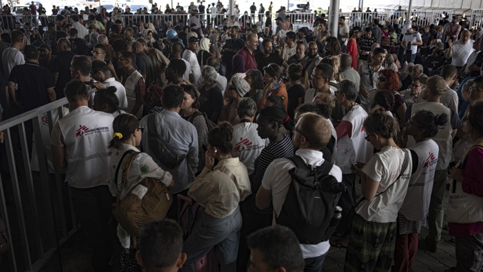Palestinians and foreign aid workers wait to cross into Egypt at Rafah, Gaza Strip, on Wednesday, Nov. 1, 2023. Photo / AP