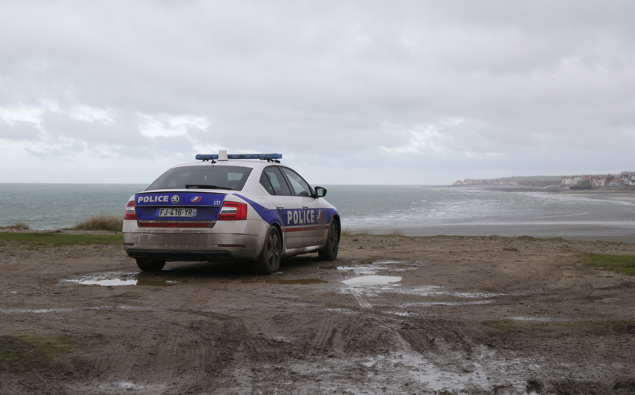 A police car parks over the shore in Wimereux, northern France, Thursday, Nov. 25, 2021 in Calais, northern France. (Photo / AP)