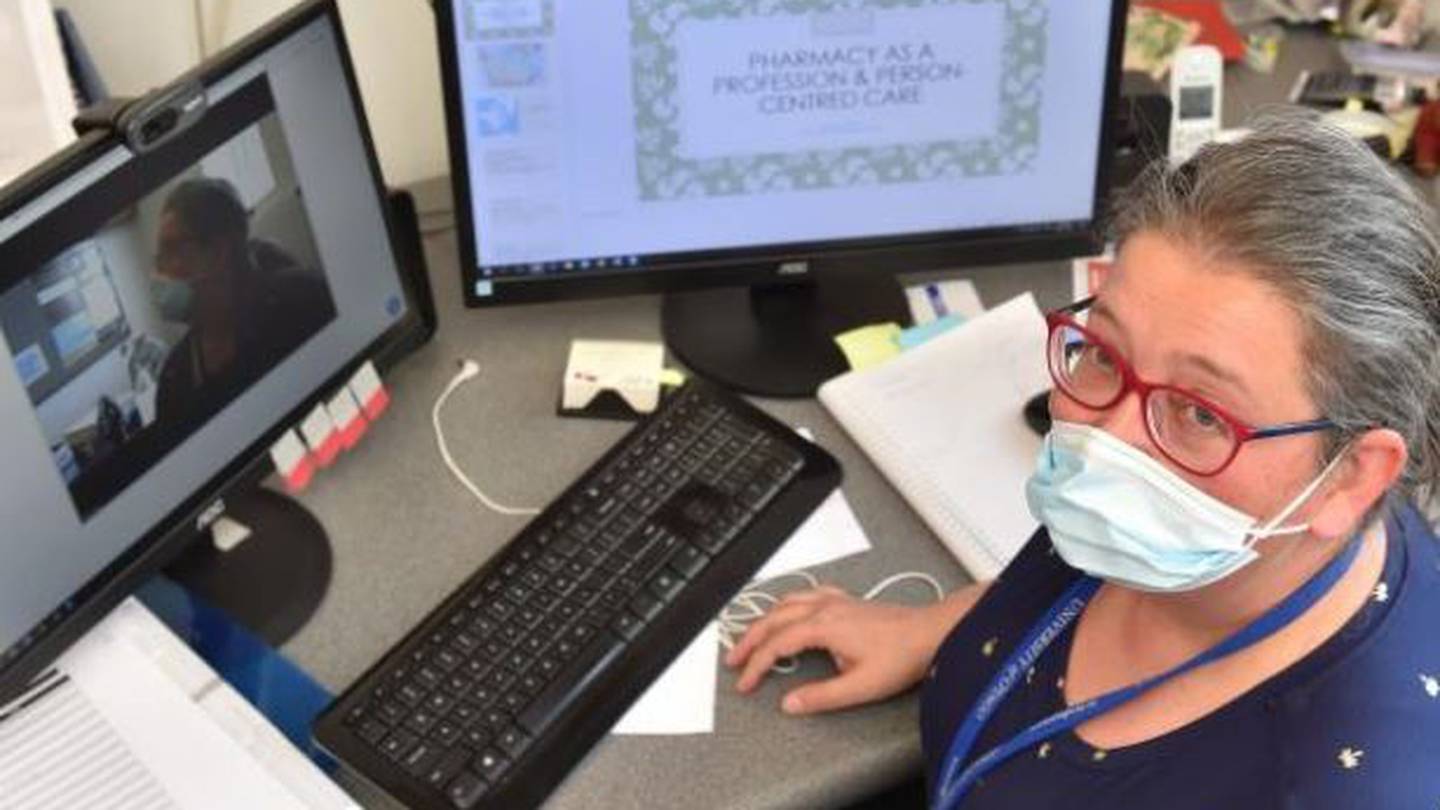 Dr Carla Dillon at her computer, the portal to her class. Photo / Gregor Richardson