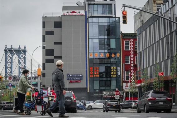A six-storey glass facade building is believed to be the site of a foreign police outpost for China in New York's Chinatown. Photo / AP
