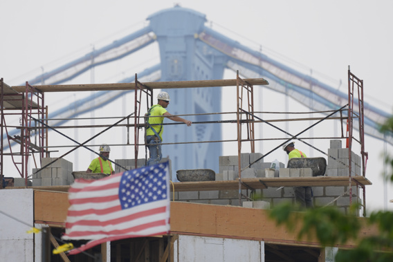 The haze from Canada's wildfires is taking its toll on outdoor workers along the Eastern U.S. who carried on with their jobs even as dystopian orange skies forced the cancelation of sports events, school field trips and Broadway plays. Photo / AP