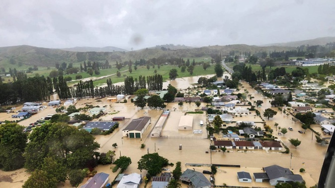 An aerial view of the flooding in Wairoa in Hawke's Bay, soon after the cyclone. Residents displaced by the cyclone damage will add to pressure in the region's rental market. Photo / Wairoa District Council