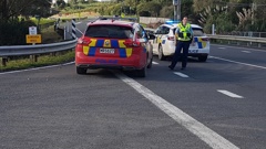 The police roadblock on SH10 at Kaingaroa near where two people died when two trucks collided on May 30. Five people have died on Northland’s roads this week. Photo / Mike Dinsdale
