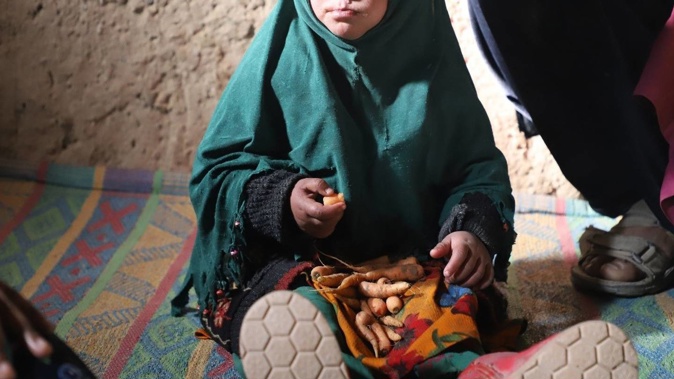 Three-year-old 'Jamila' in her family home in Herat, Afghanistan, moments before her parents sell her for US$600 so they can feed their other children. Photo / World Vision