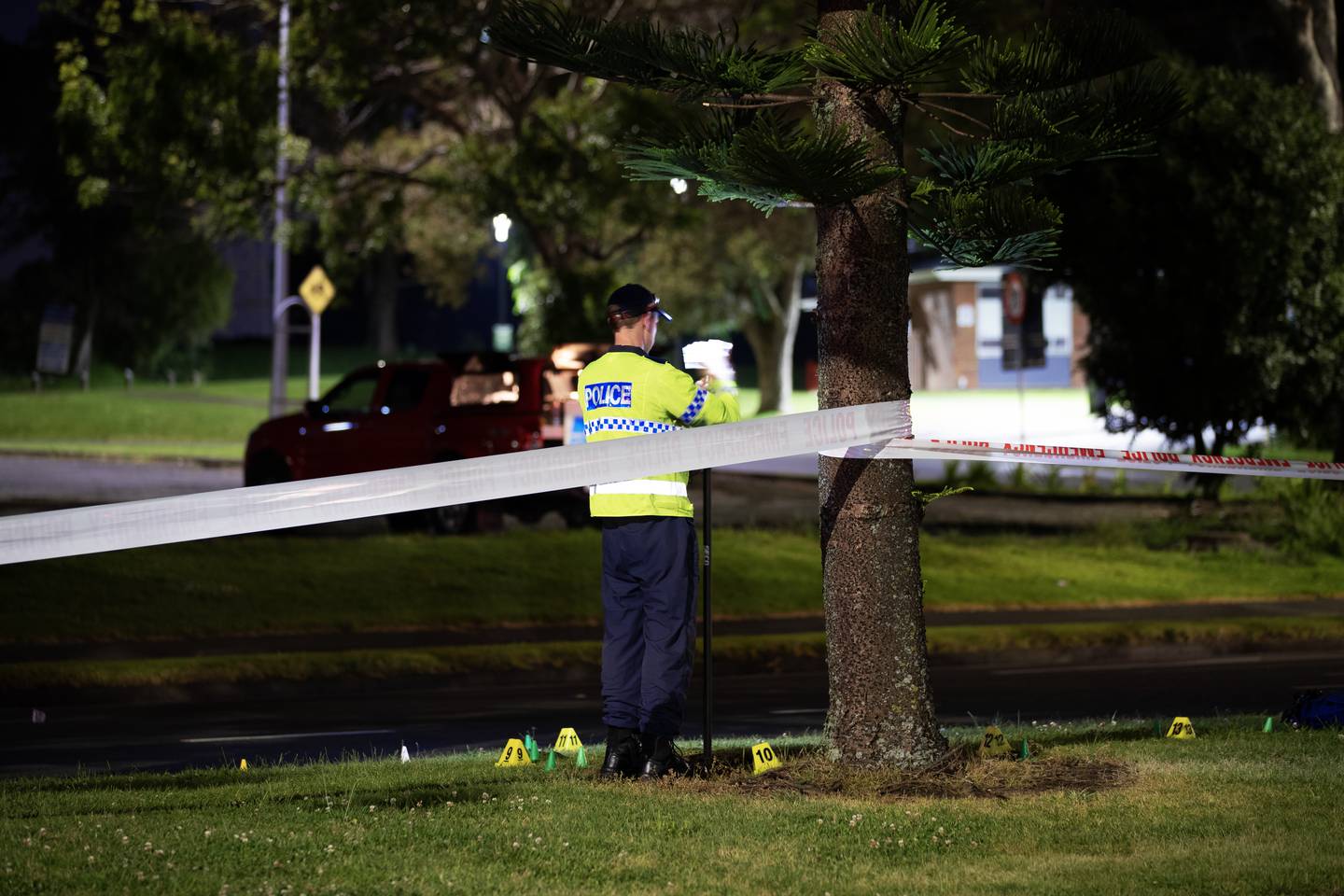 The serious crash unit works at Manukau Station Rd after an officer deploying road spikes was allegedly struck by the vehicle being tracked by police.