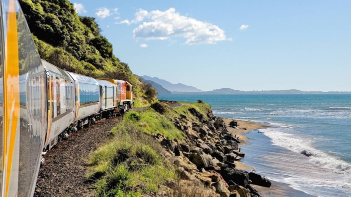 The Coastal Pacific rail service passenger train on Kaikoura coast. Photo / Great Journeys