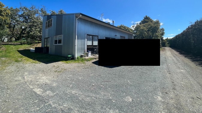 John Murray Addison was convicted for allowing this implement shed to be used as a dwelling. The image has been edited for privacy. Photo / Bay of Plenty Regional Council