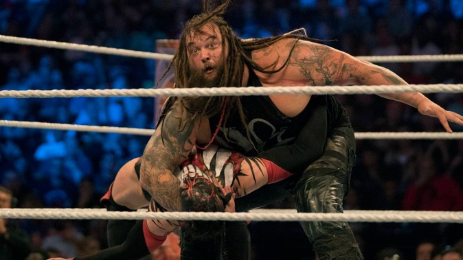 Bray Wyatt (top) in action vs Finn Balor during match at Barclays Center in 2017. Photo / Getty Images