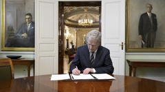Finland's President Sauli Niinisto signs Finland's national Nato legislation in Helsinki, Finland. Photo / AP